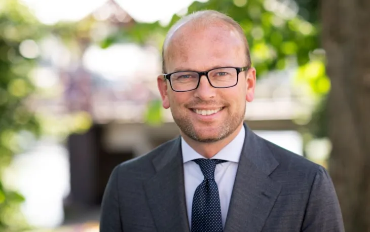 Portrettfoto av en smilende Kristian Dahlberg Hauge