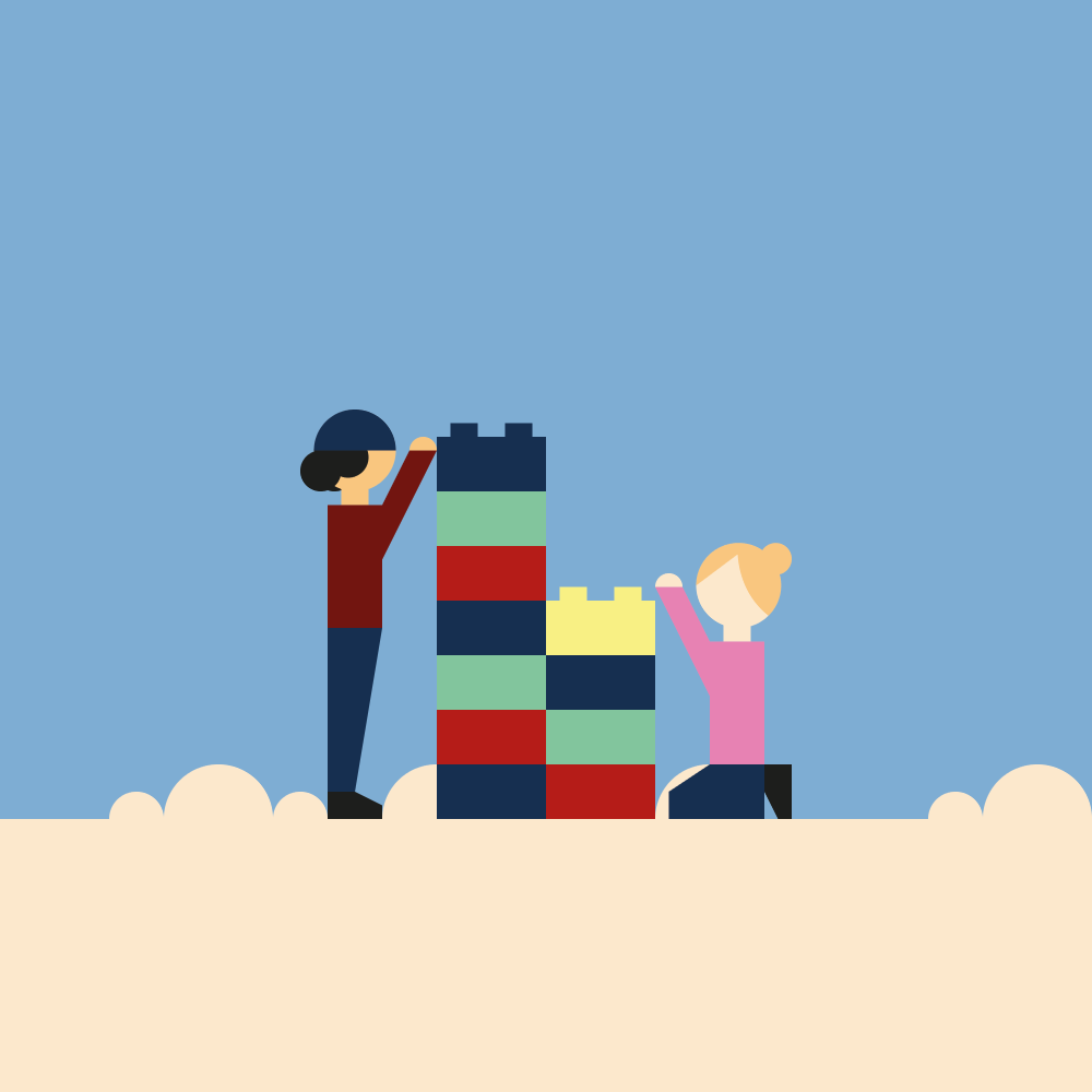 To barn bygger tårn av klosser