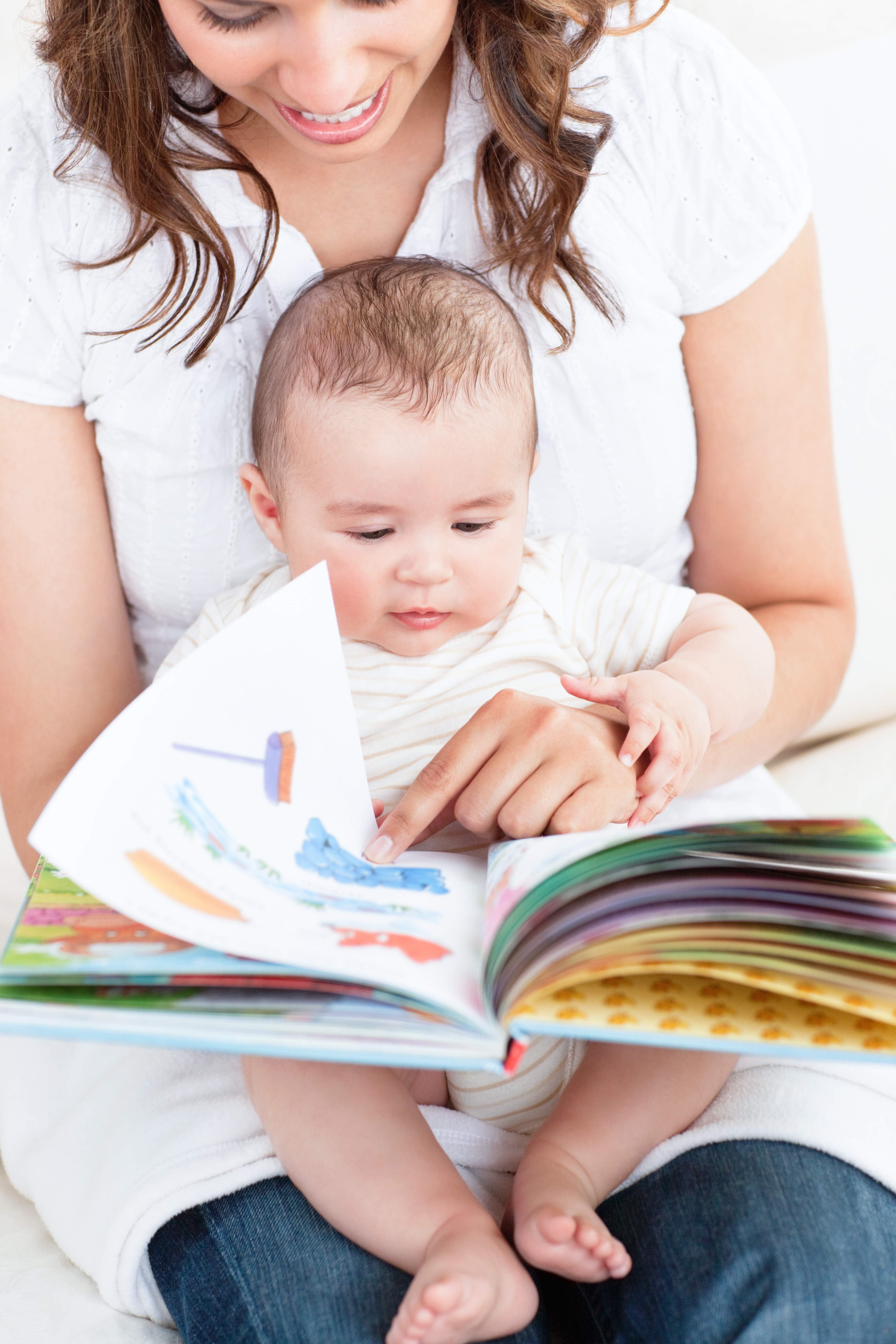 Mother showing a book