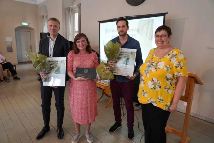 Rita Ottervik sammen med vinnerne av Byggeskikkprisen 2019